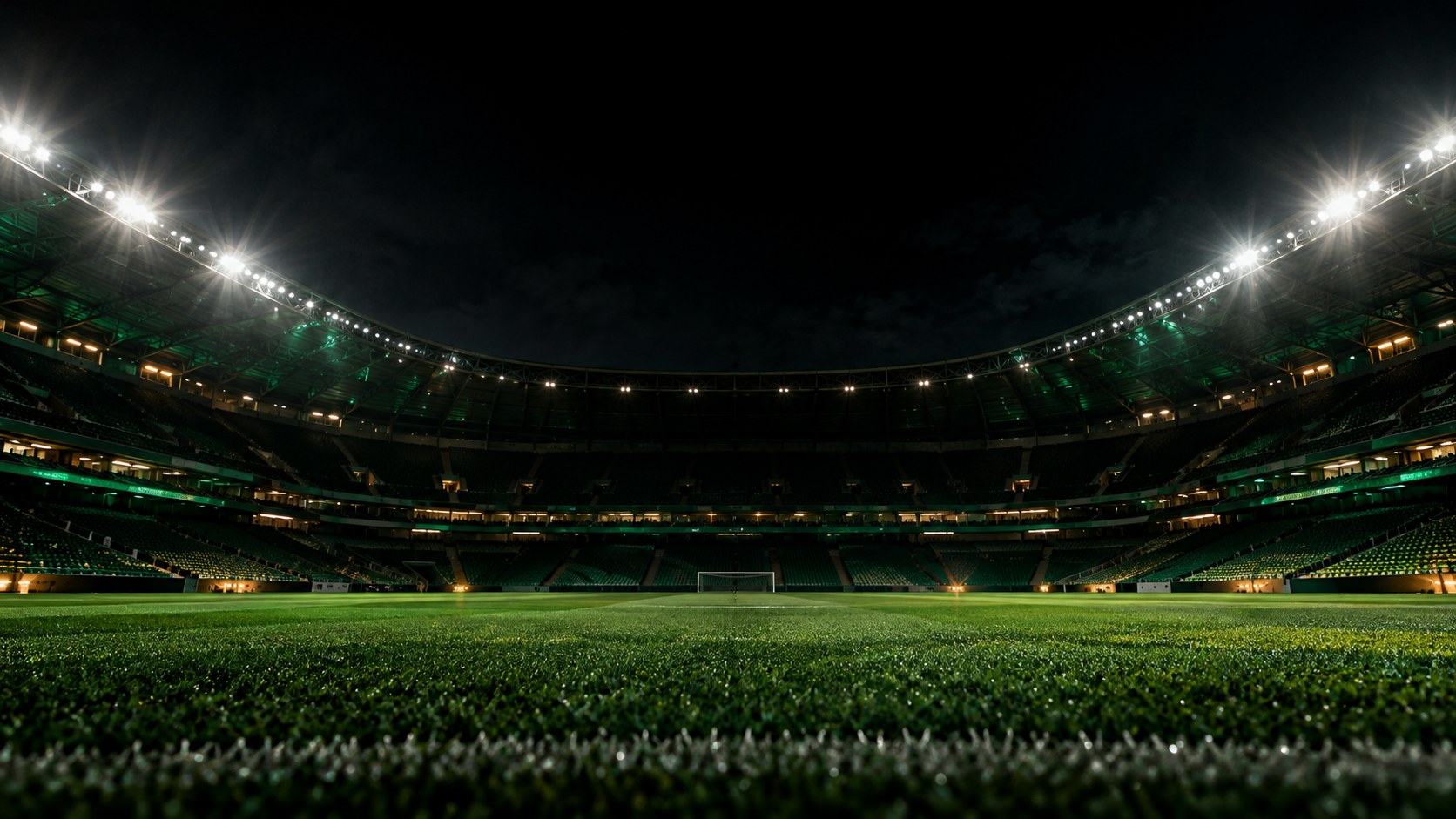 Estádio de futebol iluminado à noite